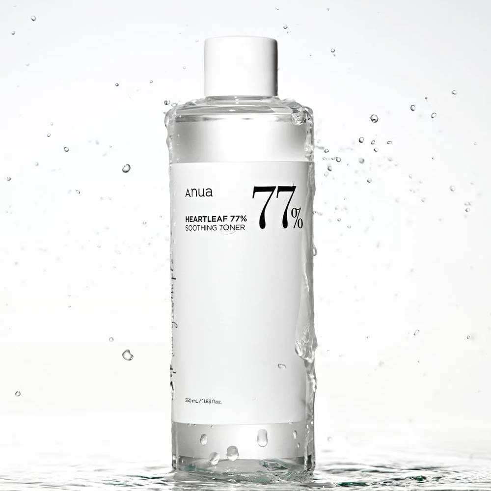 Anua Heartleaf 77% Soothing Toner - Bottle with Water Splash on White Background