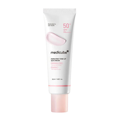 Medicube+ PDRN Pink Tone Up Sun Cream surrounded by pink bubbles