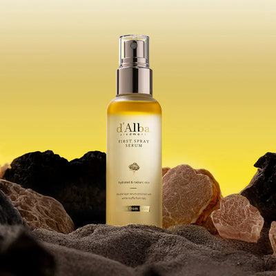 d'Alba Piedmont First Spray Serum - Fine Mist Spray in Action on Dark Background