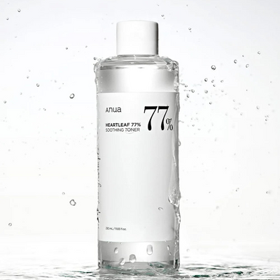 Anua Heartleaf 77% Soothing Toner - Bottle with Water Splash on White Background