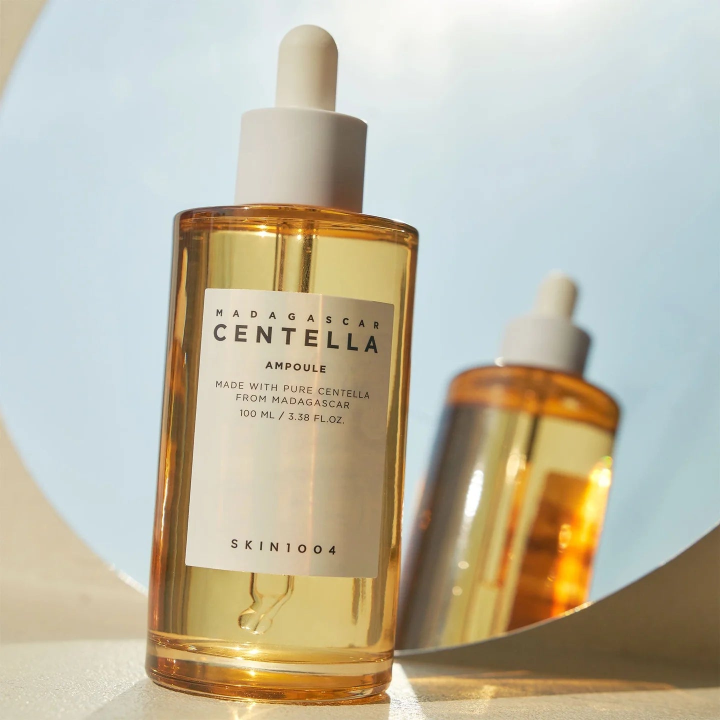 SKIN1004 Madagascar Centella Ampoule 100ml — golden dropper bottle lifestyle